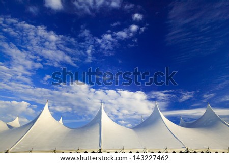 Top of a large event tent against a blue sky in Stowe, Vermont, USA