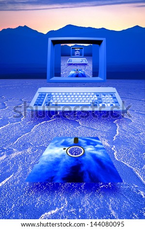 Retro image of an old fashiond omputer and floppy disc floating over blue salt flats.