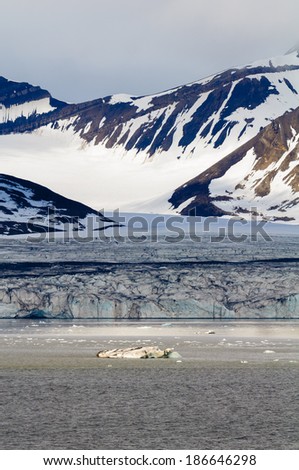 The end of a glacier in the Arctic Circle where it falls into the Arctic Ocean in Hornsund, Svalbard, Norway.