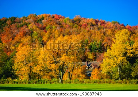 Trapp Family Lodge surrounded by fall foliage, Stowe, Vermont, USA