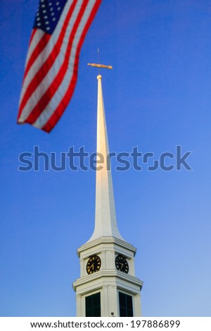 Stowe Community Church steeple with the american flag, Stowe, Vermont, USA
