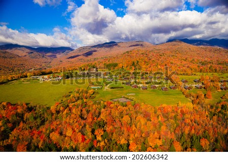 Aerial view of fall foliage including Trapp Family Lodge, Stowe, Vermont, USA