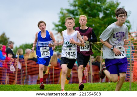 THETFORD CENTER, VT, USA - OCTOBER 4, 2014: Middle school boys running the 24th annual Thetford Academy Woods Trail Run, middle school boys division.