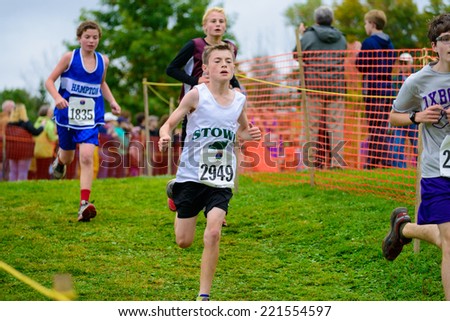 THETFORD CENTER, VT, USA - OCTOBER 4, 2014: Middle school boys running the 24th annual Thetford Academy Woods Trail Run, middle school boys division.