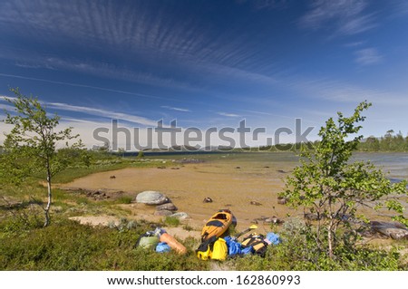 Kayak at a sandy beach, lake rogen, nature reserve, haerjedalen, sweden