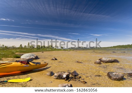 Kayak at a sandy beach, lake rogen, nature reserve, haerjedalen, sweden