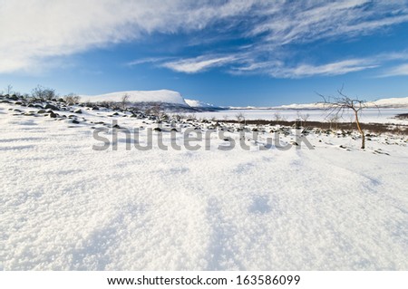 View at the frozen lake akkajaure, lapland, sweden