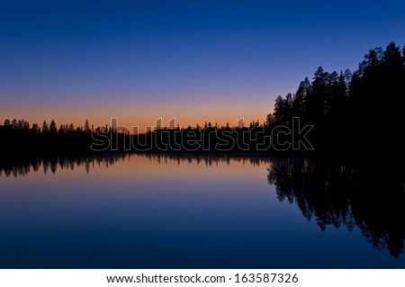Afterglow at a forest lake, lapland, afterglow at a forest lake, lapland, sweden