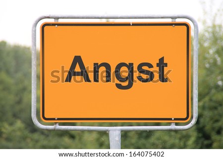 A road sign in german language, translation: fearful