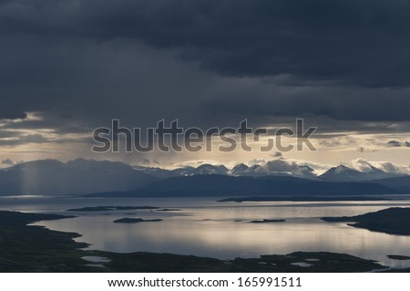 Rain over the Lake Virihaure, Padjelanta Nationalpark, in Background the Mountains of  Sarek National Park, World Heritage Laponia, Lapland, Sweden