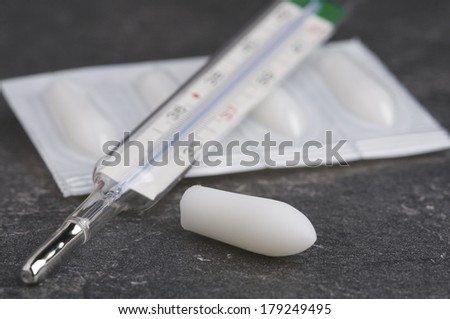 Suppository and Clinical Thermometer