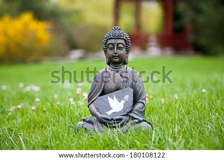 Dove of Peace with Buddha Statue