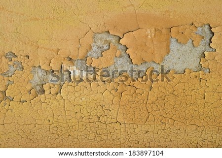Facade of an old building with peeling paint