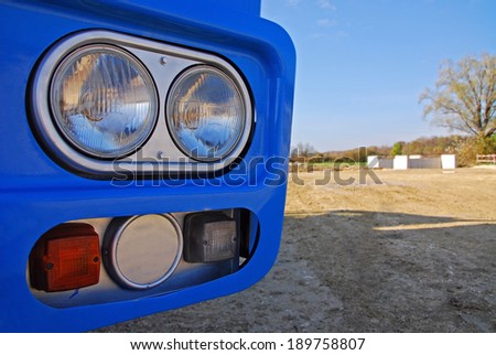Headlights of a truck on construction site