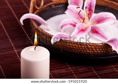 Bowl with lily and candle