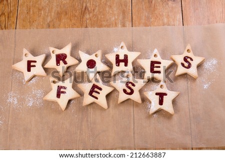 Happy Christmas bakery, cookies with the German words: 