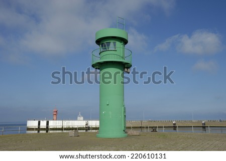 Lighthouse at the mole in Buesum, Germany