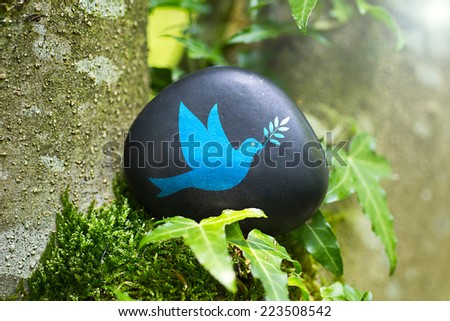 The  Dove of Peace on a stone in nature