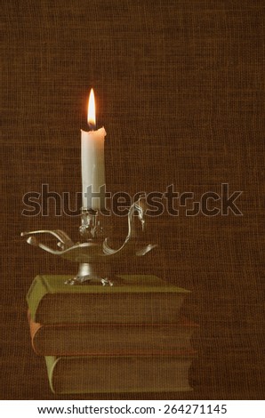 still life with books and candle