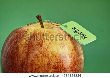 fresh apple with label organic