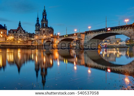 The famous church called  Hofkirche and a bridge over the river Elbe in Dresden, Germany, at dawn