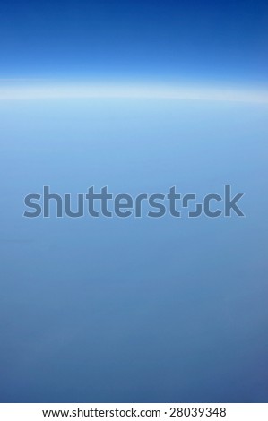 calm ocean surface viewed from above on perfectly clear day