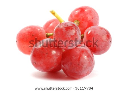 a bunch of red grapes on white background