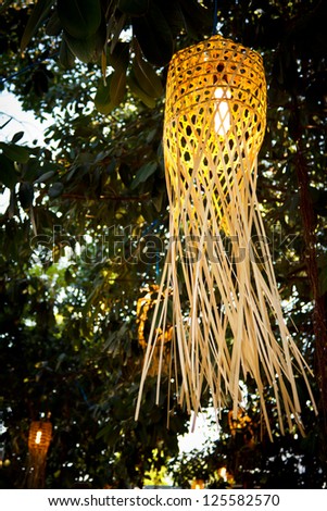 weave lamp on the tree