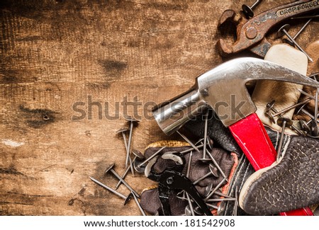 tool renovation on grunge wood background