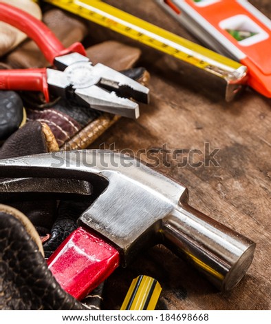 tool renovation on brown wood background