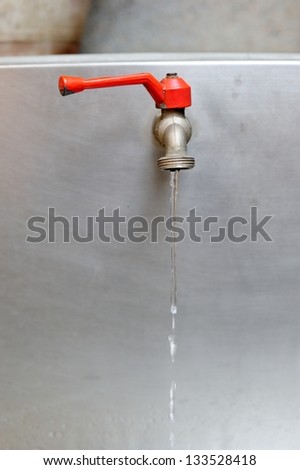 Water leaking from old metal tap