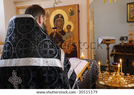 The orthodox priest serves in church of a female monastery