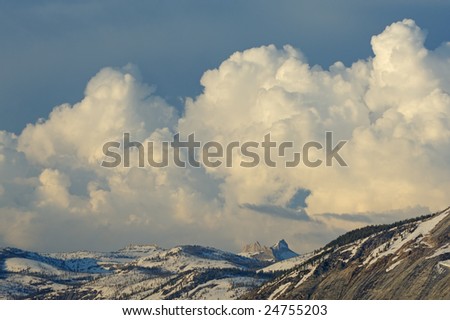 Mountain landscape with beautiful clouds from Glacier Point, Yosemite National Park, California USA