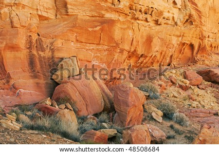 Landscape of textured, eroded cliff wall and rock pile, Valley of Fire State Park, Nevada, USA