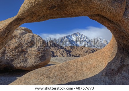 Stone arch framing Lone Pine Peak, Eastern Sierra Nevada Mountains, California, USA