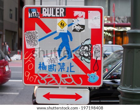 SHINJUKU, TOKYO - FEBRUARY 11: Graffiti sticker or street culture on February 11, 2014.  Relatively small number of graffiti in Tokyo, than other international cities because of strict police control.