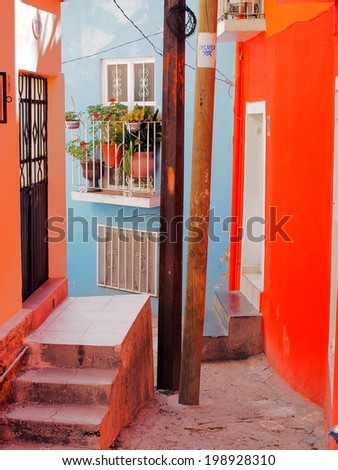 GUANAJUATO, MEXICO - OCTOBER 26, 2013: World Heritage Site (1988). Historic mine city has a lot of colorful 16th century buildings and narrow stone paved streets. About 170,000 population.