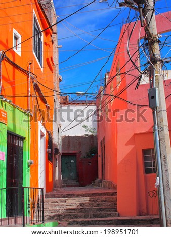 GUANAJUATO, MEXICO - OCTOBER 26, 2013: World Heritage Site (1988). Old building, painted with vibrant color in the Historic mine city of Guanajuato. The city has about 170,000 population.