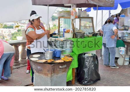 GUANAJUATO, MEXICO - NOVEMBER 9, 2013: Street restaurant or food booth in the UNESCO World Heritage city of Guanajuato.
