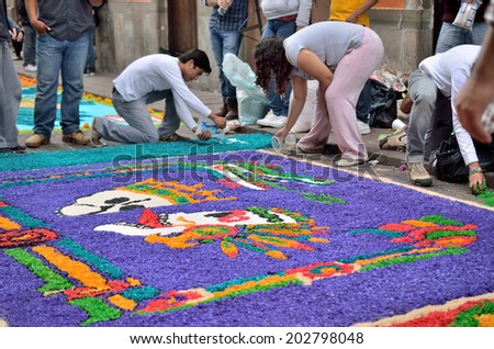 GUANAJUATO, MEXICO - NOVEMBER 2, 2013: Festival Muerte en Cartelera or Death in billboard festival. 19th cultural event celebrates in every November 2. Public art as a ritual and tribute to life.