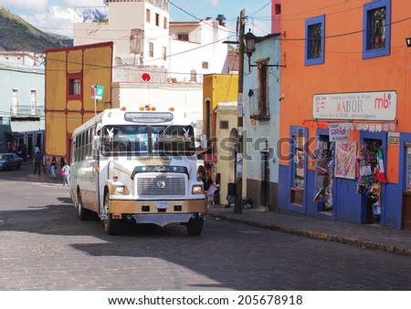 GUANAJUATO, MEXICO - OCTOBER 26, 2013: Public transportation in the Historic World Heritage Site of Guanajuato. The city has about 170,000 population.
