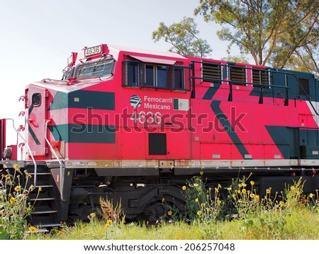 AGUASCALIENTES, MEXICO - OCTOBER 6, 2013:  Ferromex (abbreviation of Ferrocarril Mexicano or Mexican Railroad) locomotive photographed in Aguascalientes city. The largest railway company in Mexico.