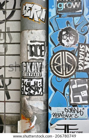 SHIBUYA, TOKYO - JULY 14, 2014: Artistic sticker graffiti or street art in Shibuya area, downtown Tokyo, Japan.
