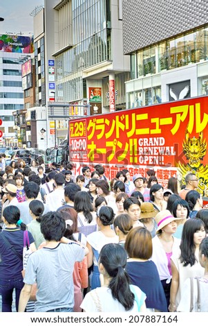 HARAJUKU, TOKYO - JULY 26, 2014: Crowd of people in front of La Foret Harajuku department store in Omotesando - Harajuku area.