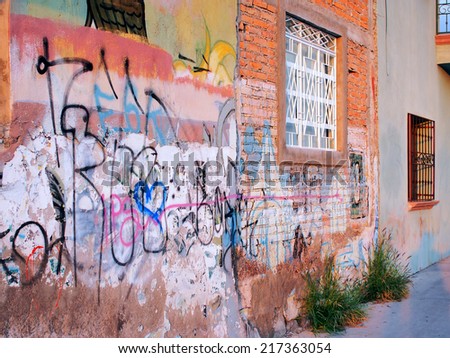 AGUASCALIENTES, MEXICO - OCTOBER 13, 2013: Graffiti painting is a kind of youth culture. Photograph is taken near the Victoria stadium, Aguascalientes, Mexico.