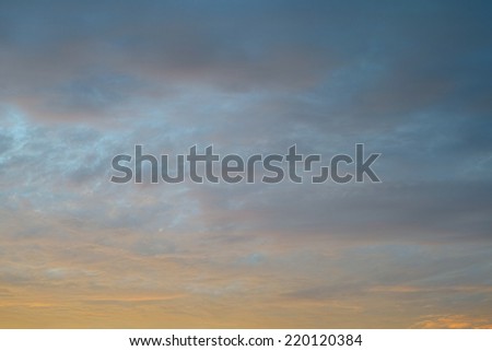 Orange clouds at sunset, background for homesickness, nostalgia or sentimentality