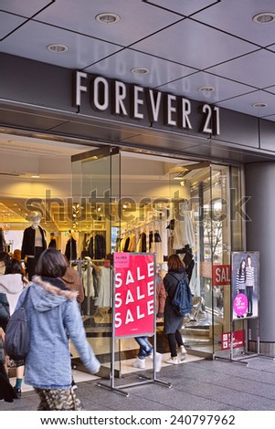 SHINJUKU, TOKYO - DECEMBER 27, 2014: Store front of Forever 21 fast fashion boutique in Shinjuku, Tokyo. Forever 21 is a international fashion chain and has about 500 branches internationally.