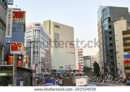 SHINJUKU, TOKYO - MAY 31, 2014: Street view of Shinjuku commercial district, one of the biggest and busiest town in Japan.