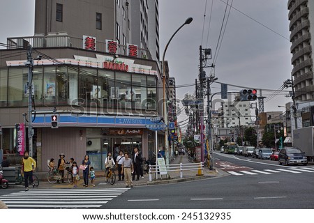 KOTO, TOKYO - JUNE 4, 2014: Lawson is the second largest convenience store chain in Japan. The company are in fierce competition with their rivals, Seven Eleven and FamilyMart.