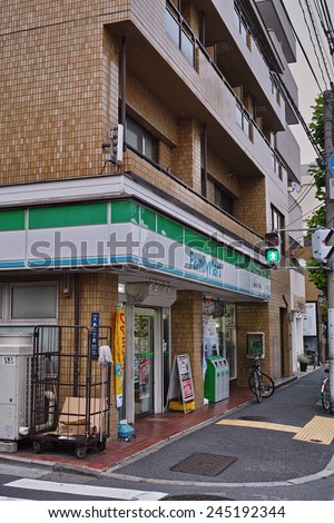 KOTO, TOKYO - JUNE 4, 2014: FamilyMart (one word) is the third largest convenience store chain in Japan. The company are in fierce competition with their rivals, Seven Eleven and Lawson.